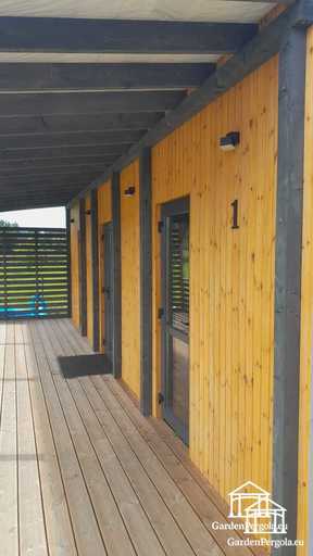 Extension de Maison en Bois Naturel avec Terrasse Couverte
